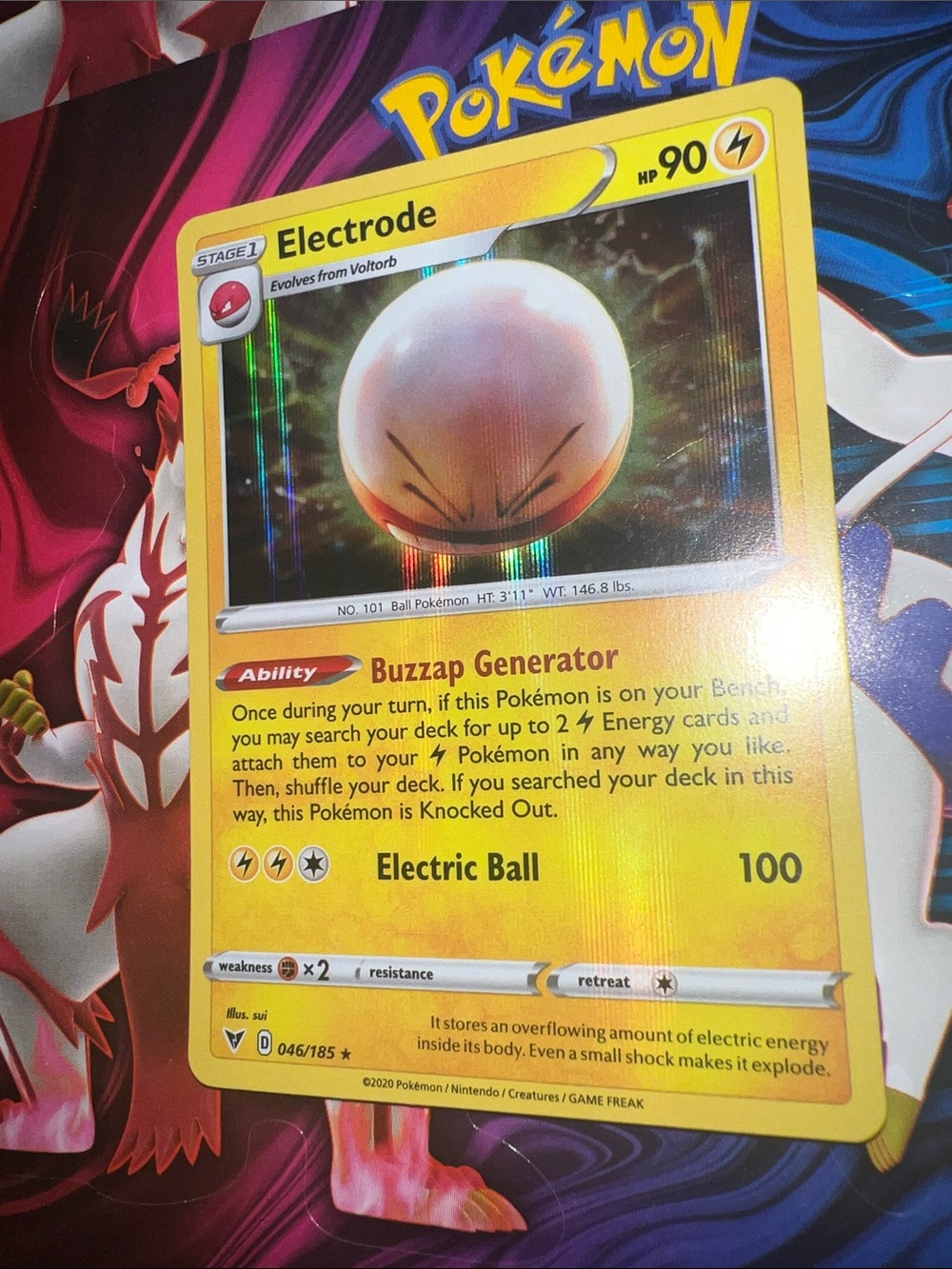 Pokemon Electrode Holographic Card — Yellow and White Artwork